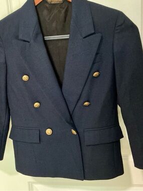 BOYS navy double breasted blazer from Nordstrom. It looks to be size 7 to 8.